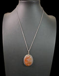 Oddly Darling Vintage oval agate pendant necklace with a silver-tone beaded frame on a delicate chain.
