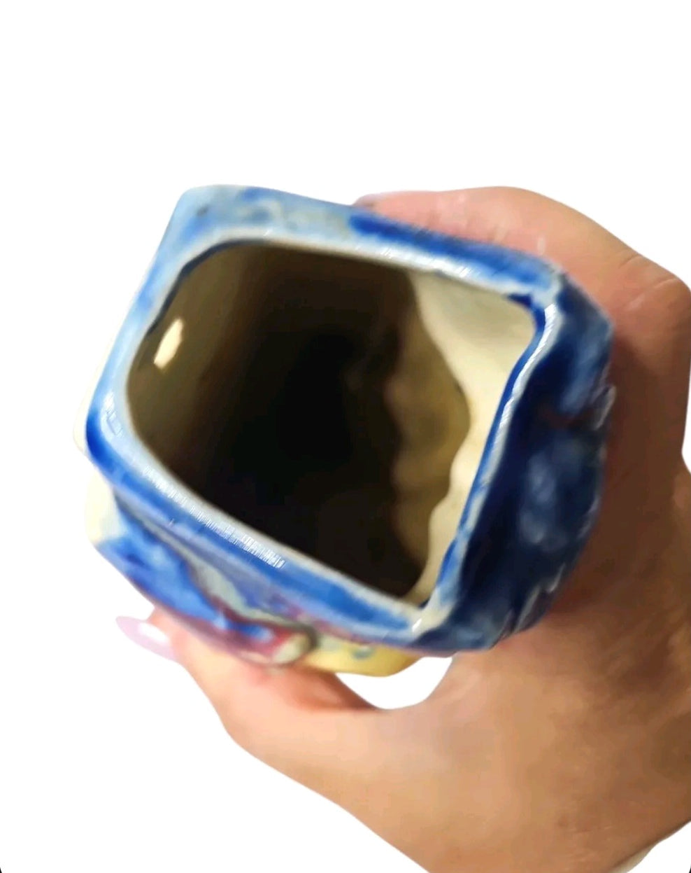 Oddly Darling Vintage ceramic owl wall pocket vase top view showing the hollow interior and glossy blue finish