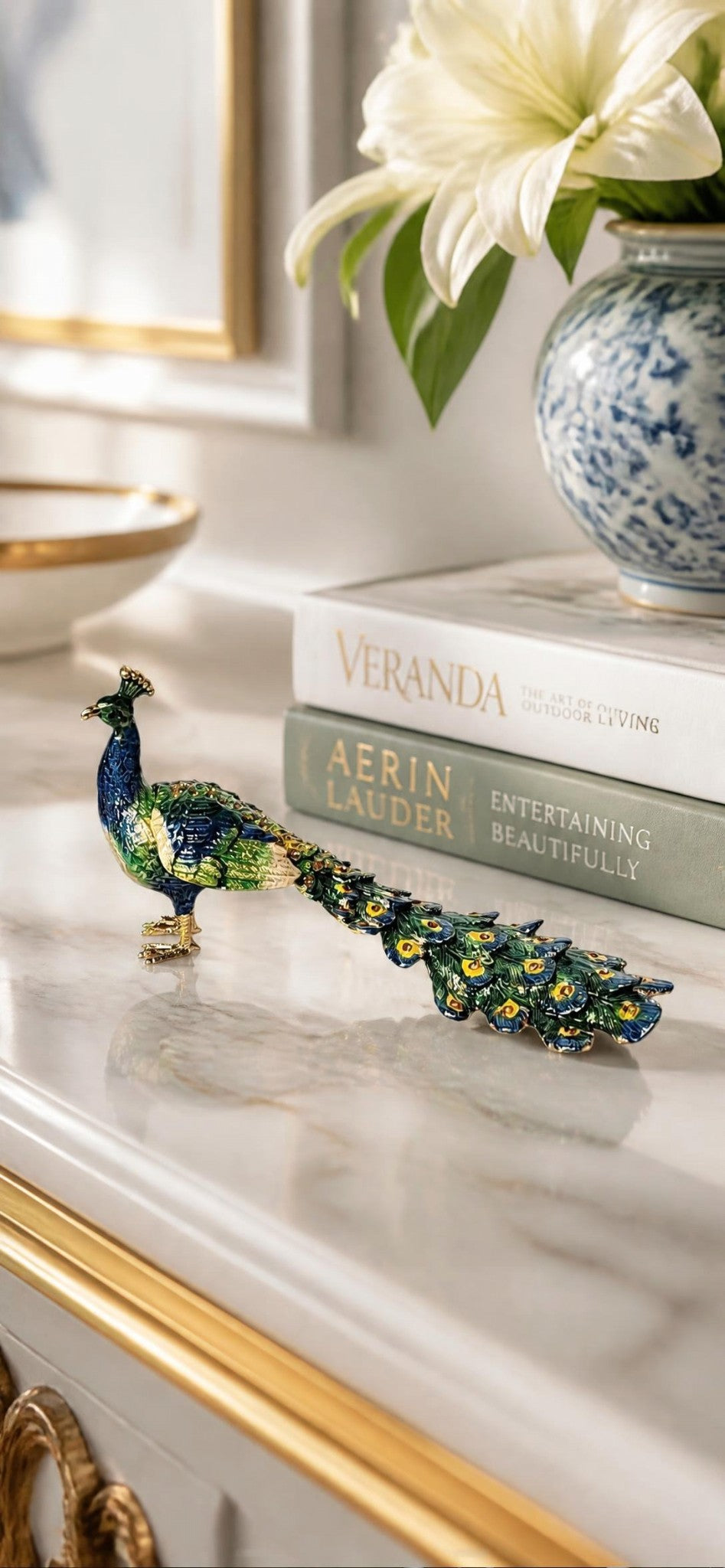 Oddly Darling Vintage peacock trinket box with sapphire blue and emerald green enamel and gold-tone accents on marble