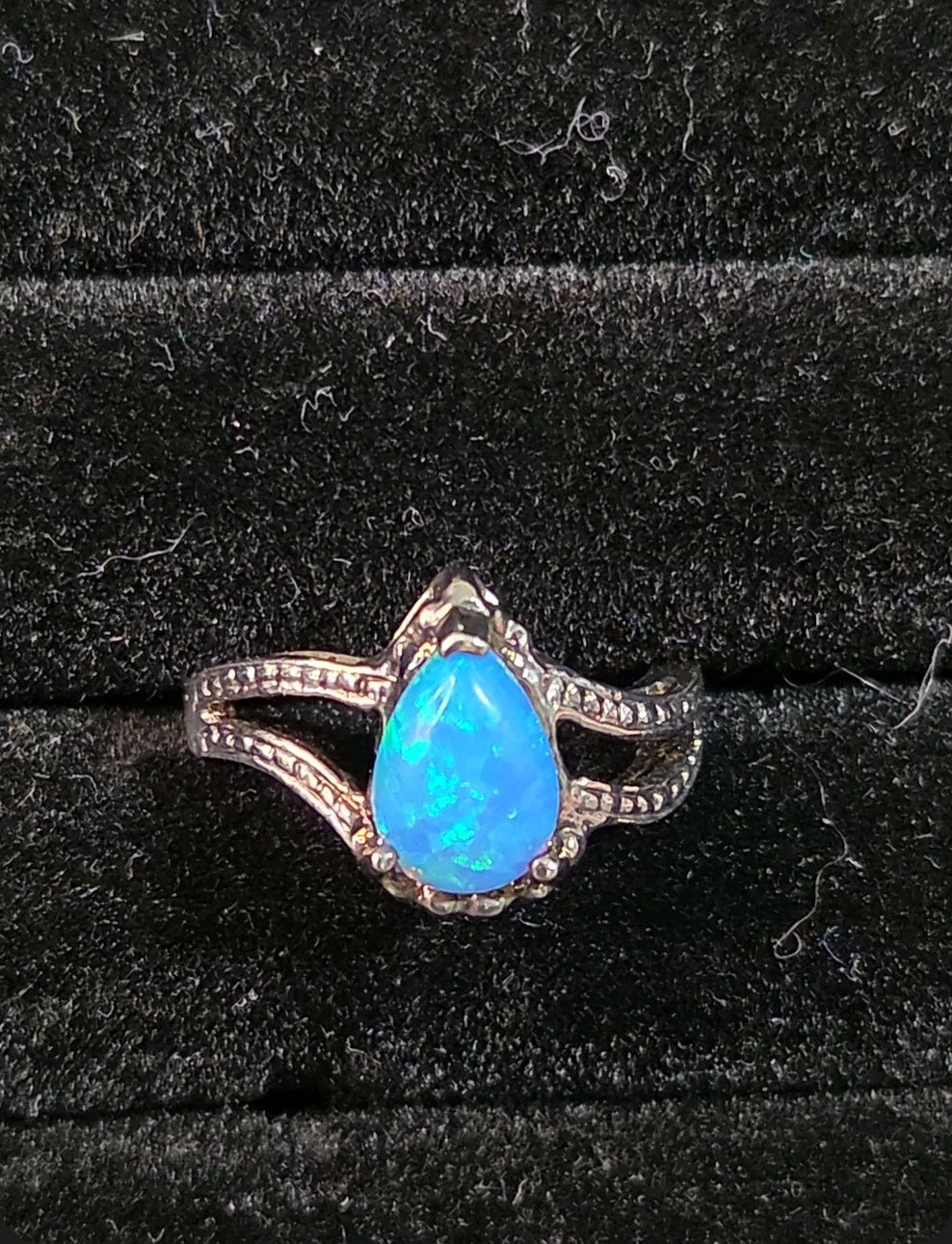 Oddly Darling Vintage pear-shaped blue opal statement ring with a textured silver-tone split-shank band.