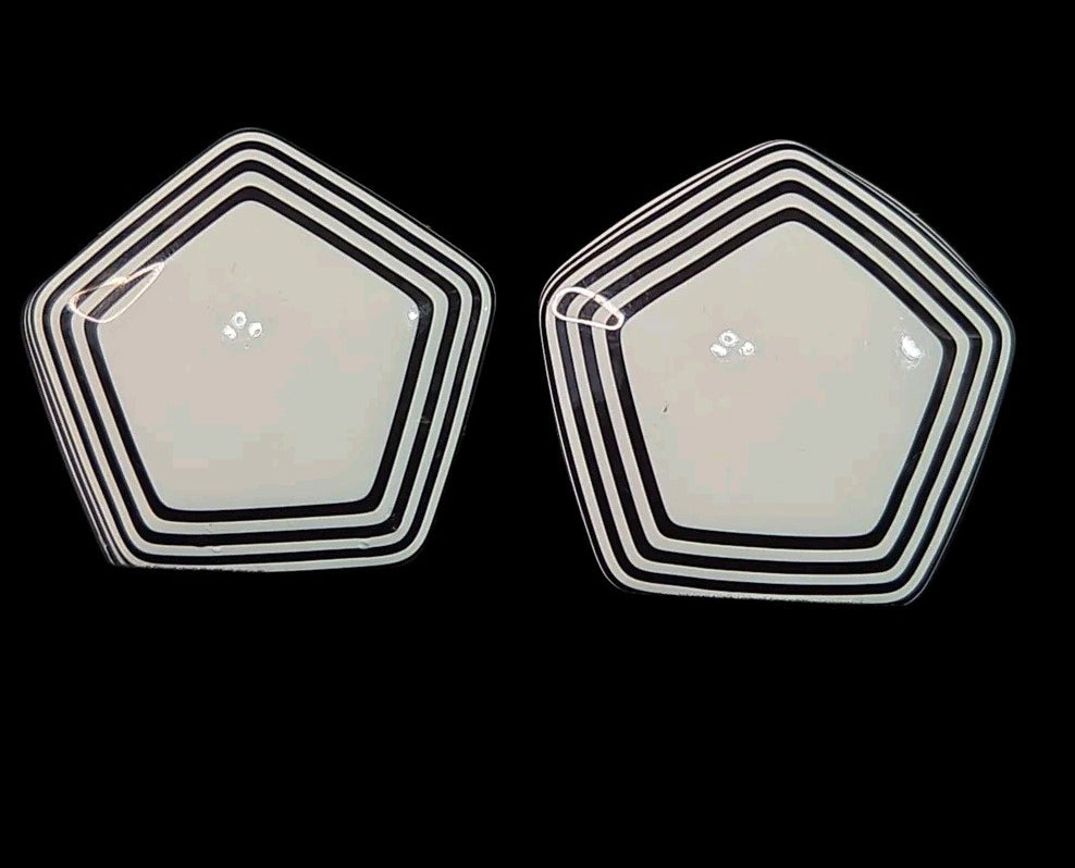 Oddly Darling Vintage pentagonal clip-on earrings with a glossy white center and black and white striped borders.