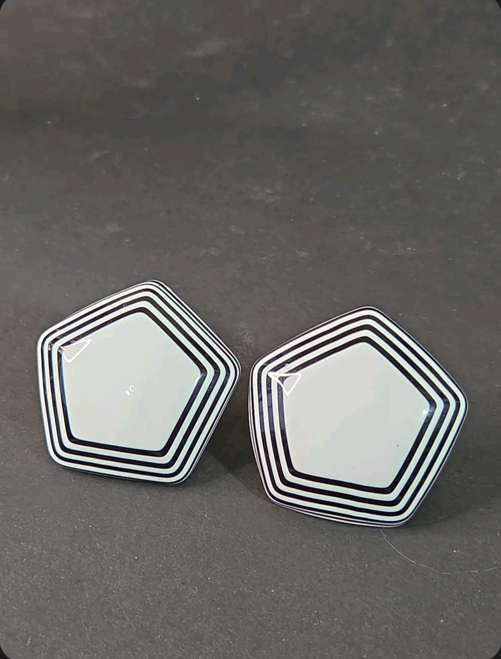 Oddly Darling Vintage geometric pentagonal clip-on earrings with a glossy white center and black striped borders.