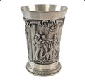 Oddly Darling Vintage SKS Zinn pewter beaker with intricate embossed rustic village scenes and a sturdy metal base.