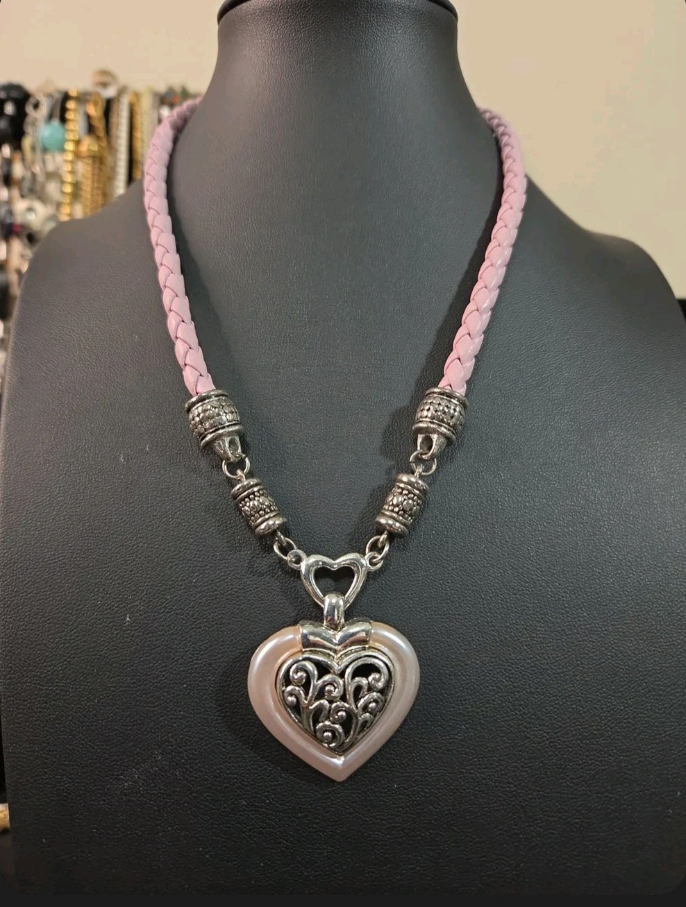 Oddly Darling Vintage heart pendant necklace with silver filigree, pearlescent pink border, and braided light pink cord