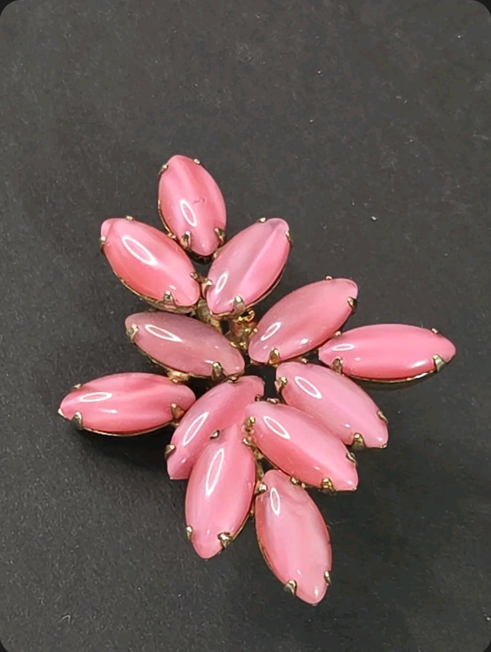Oddly Darling Vintage marquise-cut pastel pink cabochon stone cluster brooch in a gold-tone metal floral setting.
