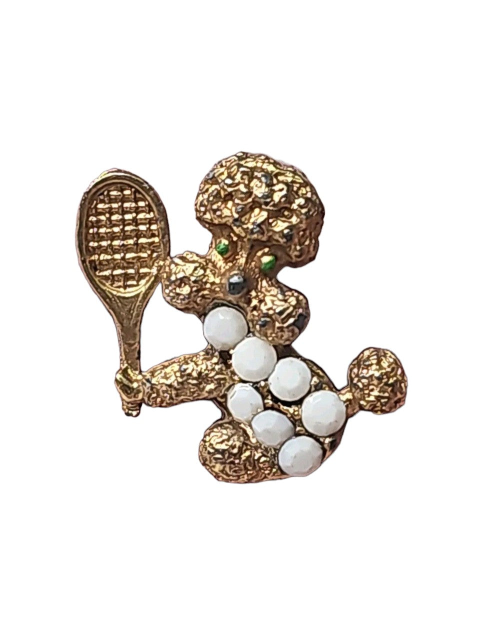 Oddly Darling Vintage gold-tone poodle brooch holding a tennis racket, with white milk glass stones and green eyes.