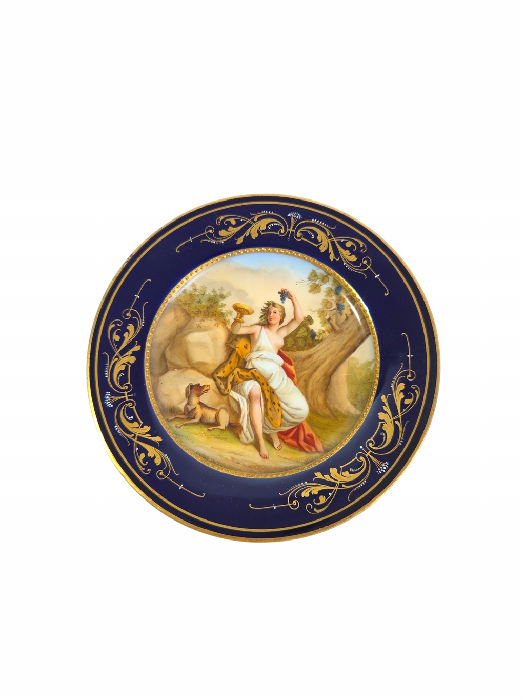 Oddly Darling Vintage porcelain display plate with a hand-painted mythological scene, cobalt blue border, and gold trim.