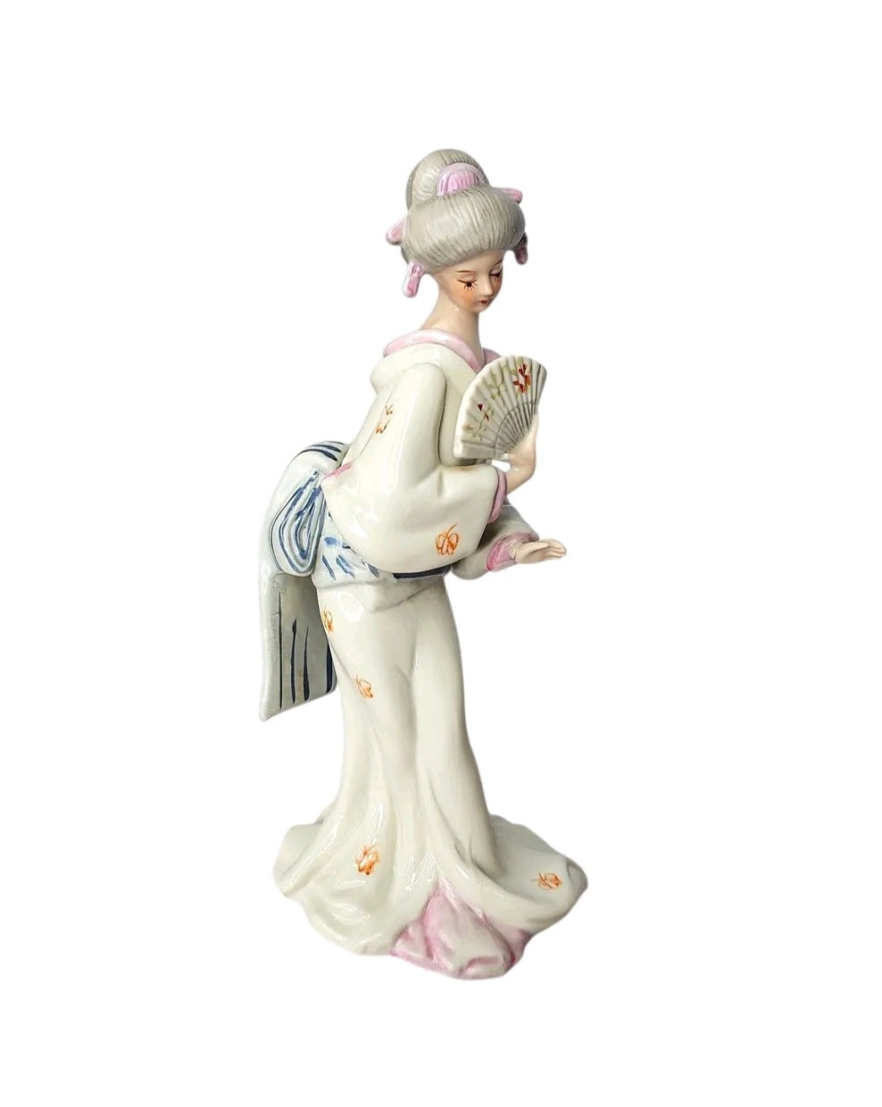Oddly Darling Vintage porcelain geisha figurine wearing a cream kimono with hand-painted floral details and a fan.