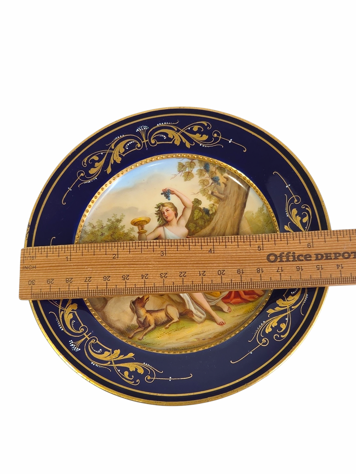 Oddly Darling Vintage decorative porcelain plate with hand-painted mythological scene, cobalt blue border, and gold-gilt
