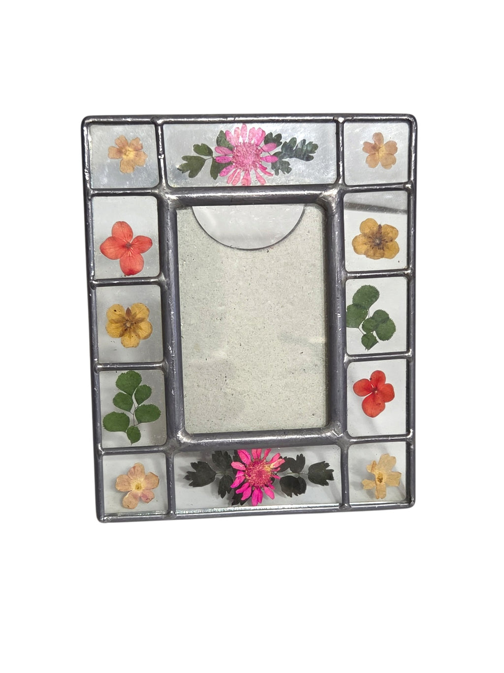 Oddly Darling Vintage pressed flower picture frame with stained-glass style metal border and colorful floral accents.