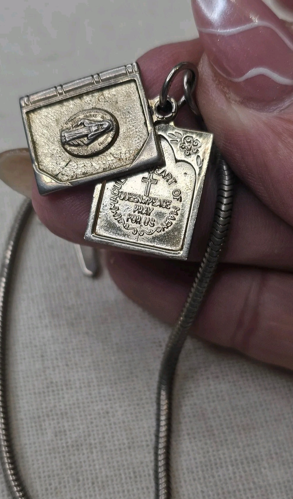 Oddly Darling Vintage silver-tone charm bracelet featuring an open book charm with Queen of Peace religious engraving.