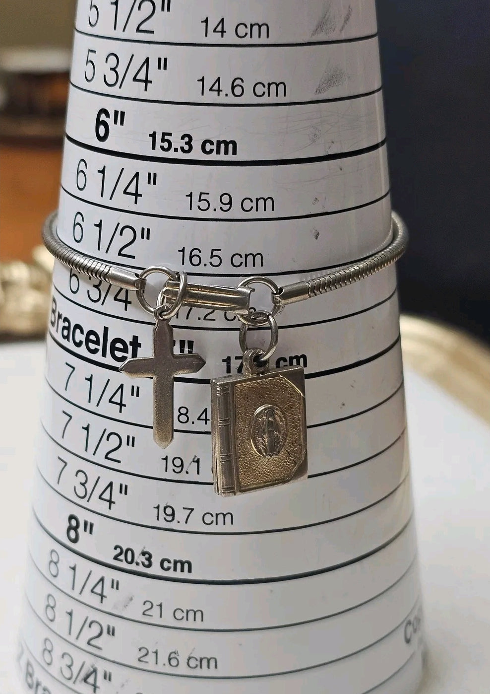 Oddly Darling Vintage silver-tone snake chain bracelet featuring a minimalist cross and an opening religious book charm