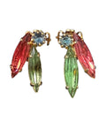 Oddly Darling Vintage gold-tone clip-on earrings featuring marquise-cut ruby red, emerald green, and blue crystals.