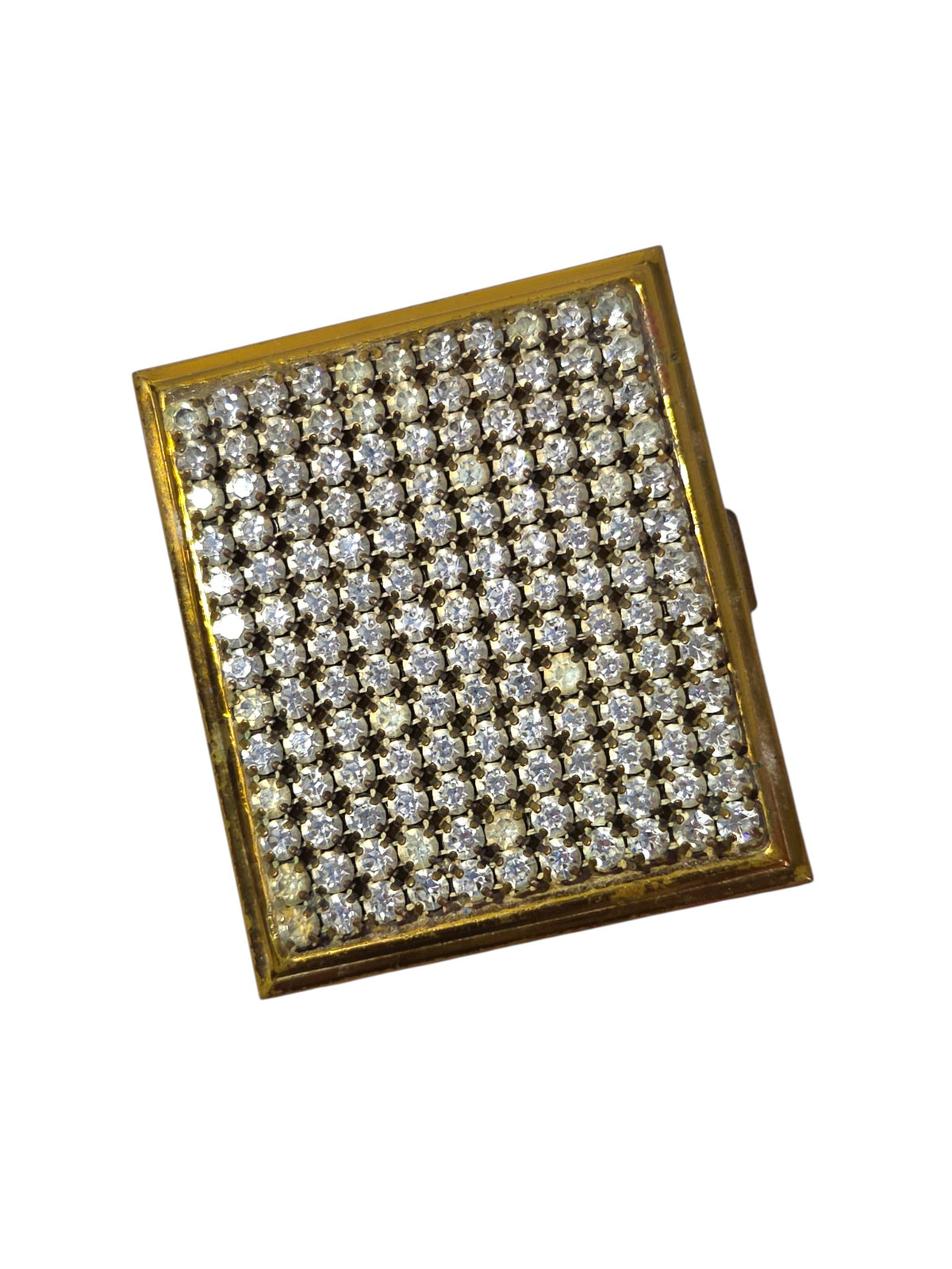 Vintage gold-tone powder compact with the lid covered in rows of prong-set clear rhinestones, a few stones dull