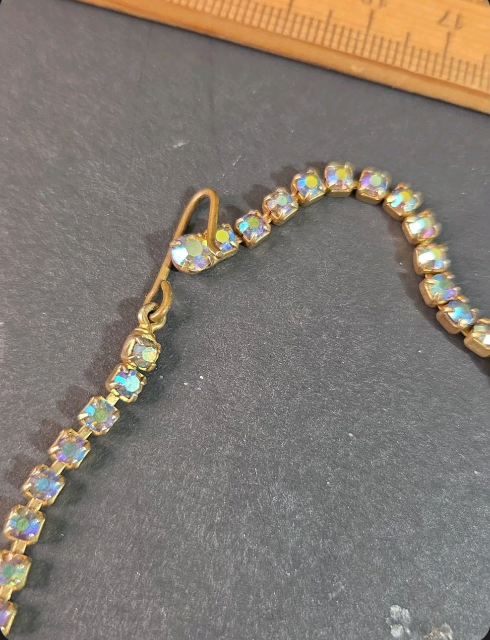 Oddly Darling Vintage gold-tone rhinestone necklace with iridescent crystals and a secure hook-and-eye clasp.