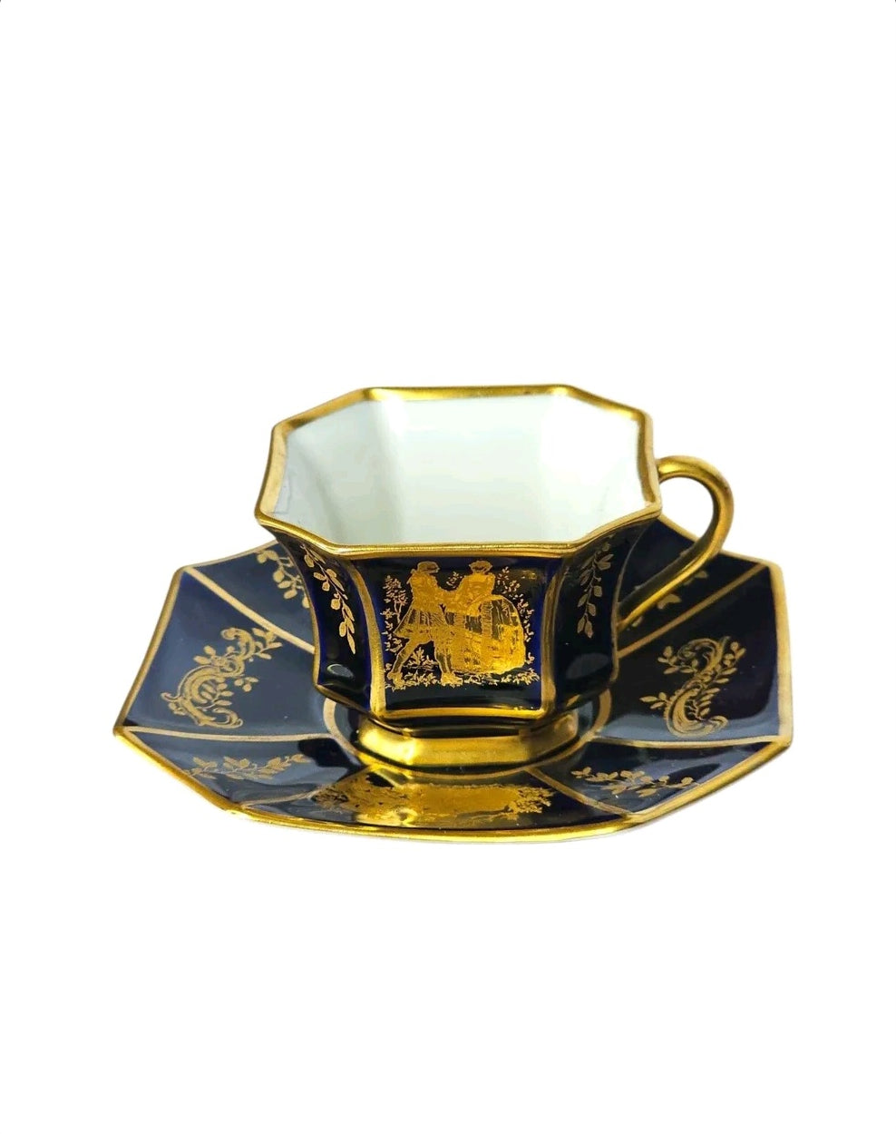 Oddly Darling Vintage Rosenthal porcelain teacup and saucer in cobalt blue with intricate gold leaf romantic scenes