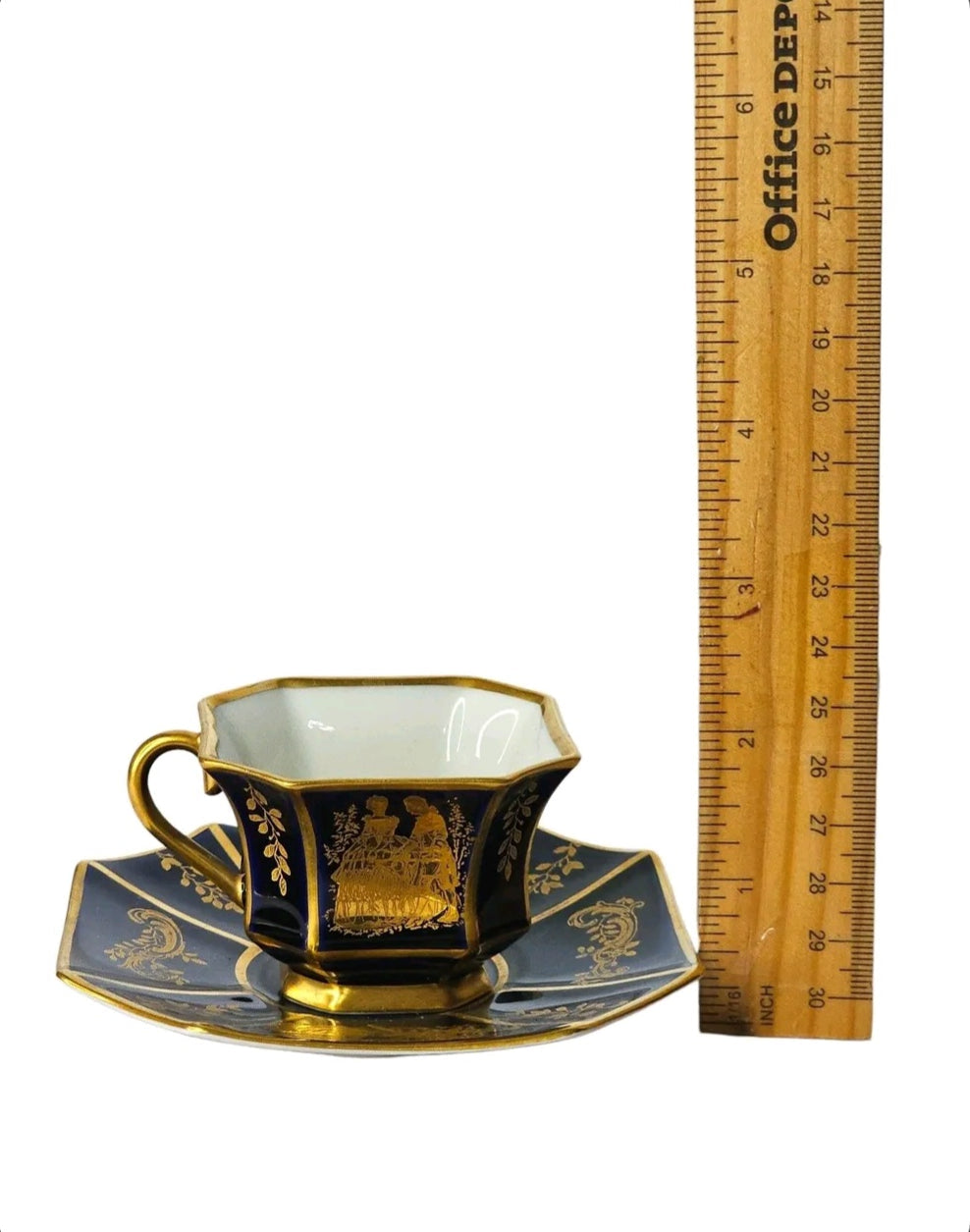 Oddly Darling Vintage Rosenthal porcelain teacup and saucer set in cobalt blue with gold leaf and octagonal shape.
