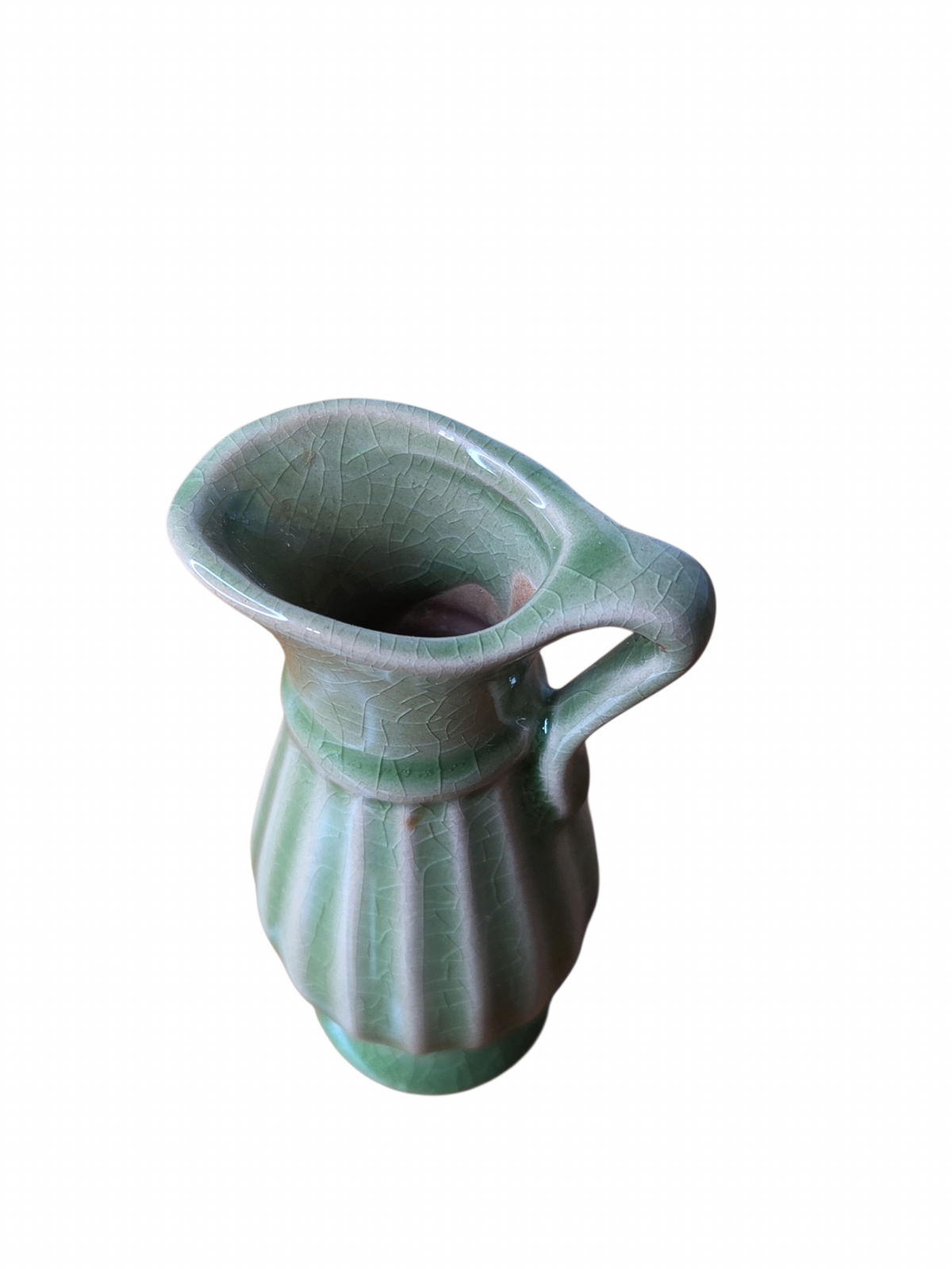 Oddly Darling Vintage sage green ceramic pitcher vase with a ribbed texture and a decorative crackle glaze finish.