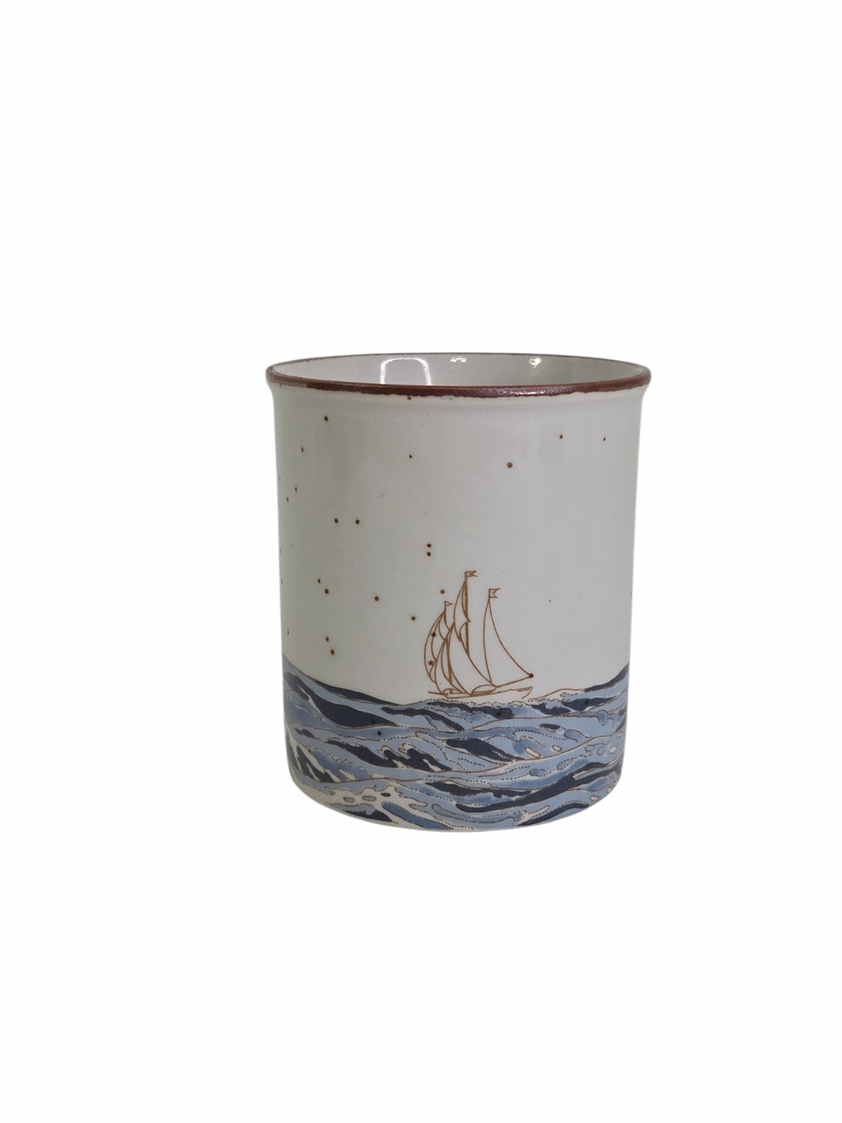 Oddly Darling Vintage ceramic coffee mug with a sailboat illustration, blue waves, and a speckled off-white finish.