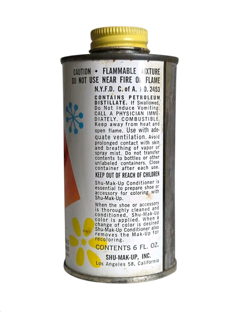 Oddly Darling Vintage Shu-Mak-Up shoe conditioner tin with 1950s starburst graphics and a yellow cap