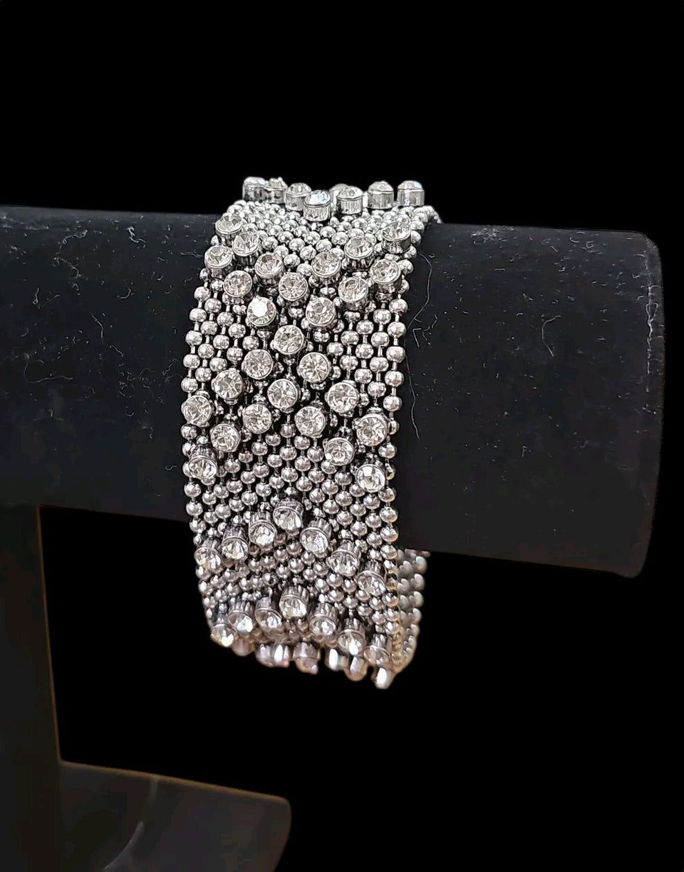 Oddly Darling Vintage wide silver cuff bracelet featuring intricate beaded mesh and shimmering faceted crystals.