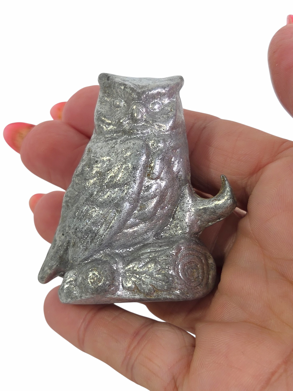Oddly Darling Vintage silver-tone owl barware bottle opener held in a hand.