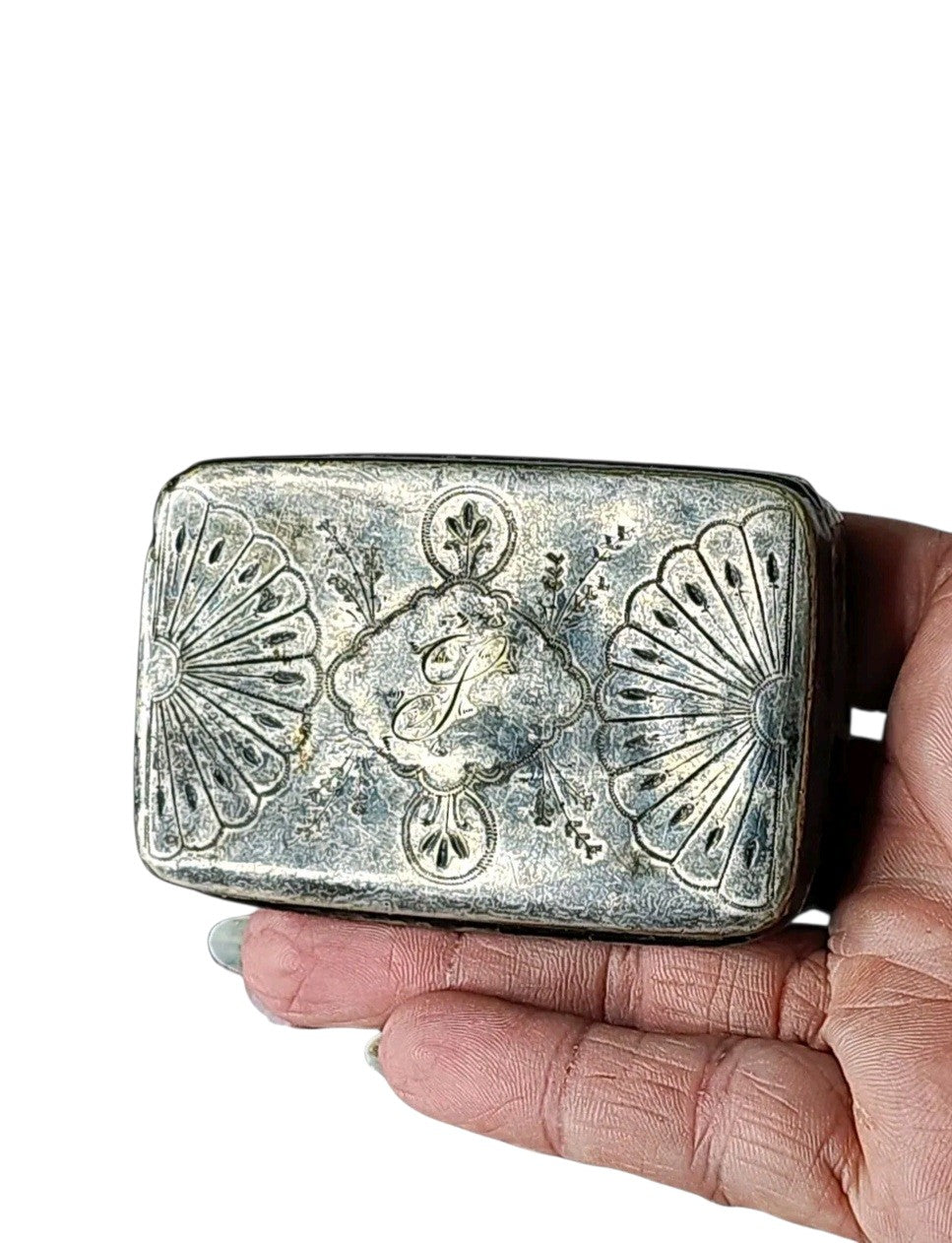Oddly Darling Vintage R. Wallace & Sons silver-soldered trinket box with ornate floral engraving and central monogram.