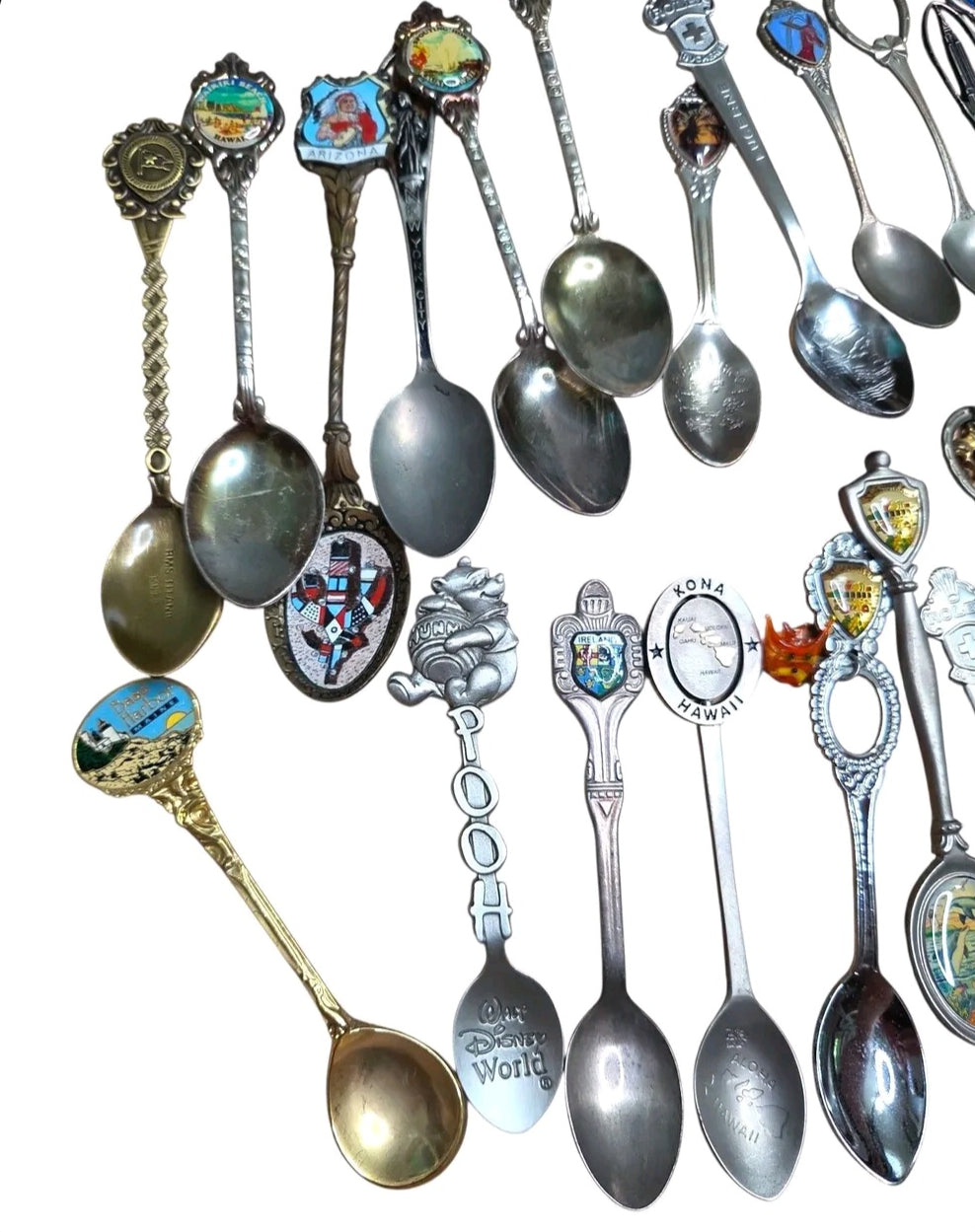 Oddly Darling Vintage collection of assorted souvenir spoons featuring travel landmarks, Disney characters, and enamel