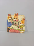 Vintage Takahashi ceramic double light switch plate with three dressed bunnies in raised relief