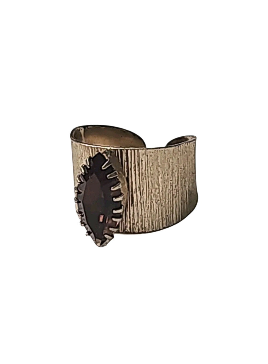 Oddly Darling Vintage wide brushed gold textured ring with a dark marquise-cut stone in a pronged setting