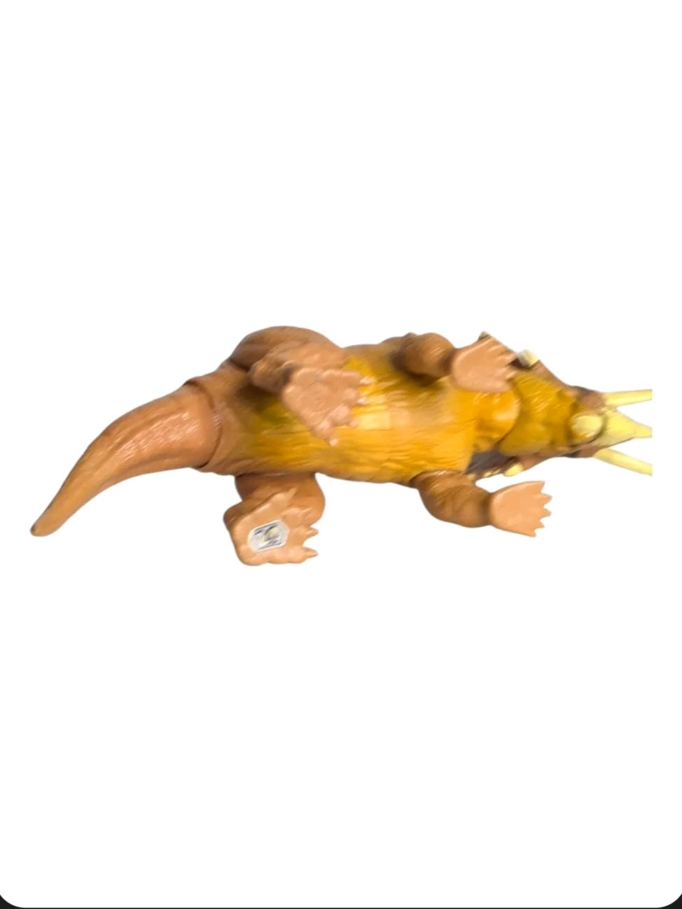 Underside of Mattel Jurassic World Pentaceratops dinosaur figure showing the scannable code on the foot
