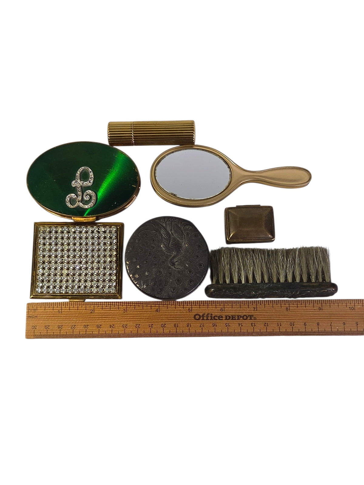 Vintage vanity lot of seven pieces laid beside a ruler for size, the brush about 4 inches long