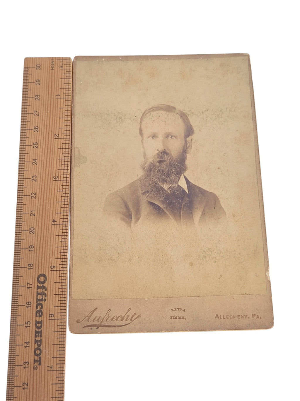 Oddly Darling Vintage antique Victorian cabinet card portrait of a bearded gentleman in sepia tones with studio mark.