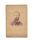 Oddly Darling Vintage antique Victorian cabinet card portrait of a bearded gentleman in sepia tones.