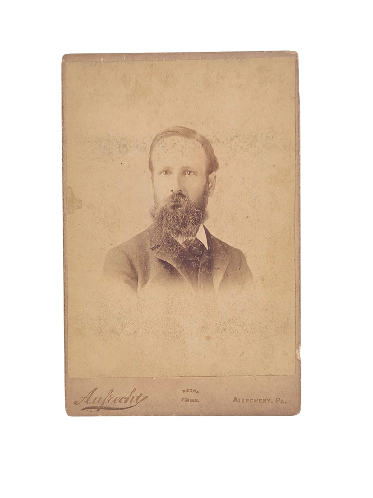 Oddly Darling Vintage antique Victorian cabinet card portrait of a bearded gentleman in sepia tones.