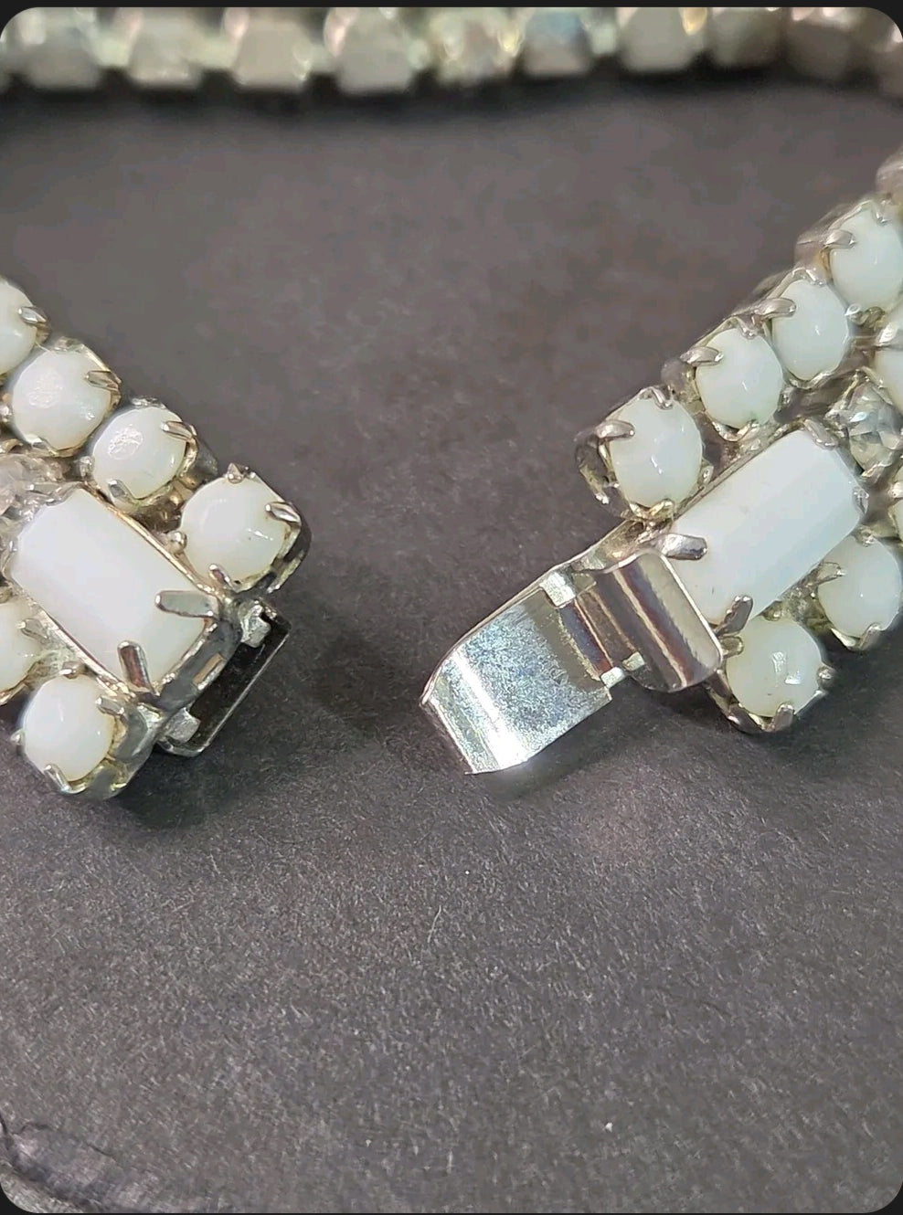 Oddly Darling Vintage multi-strand bracelet featuring milky white cabochon stones and clear crystals in silver-tone