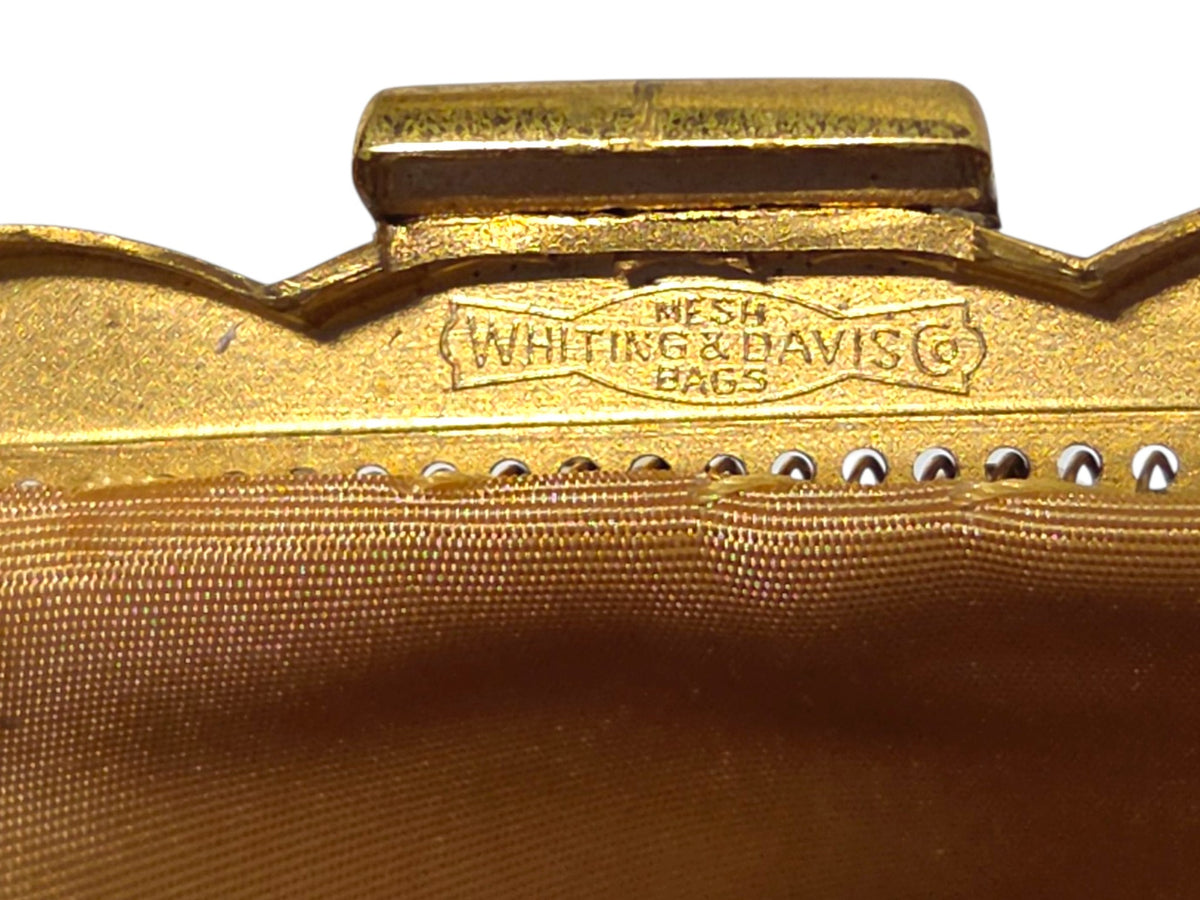 Inside the frame, stamped Mesh Whiting & Davis Bags with a copyright symbol in a bow-tie cartouche