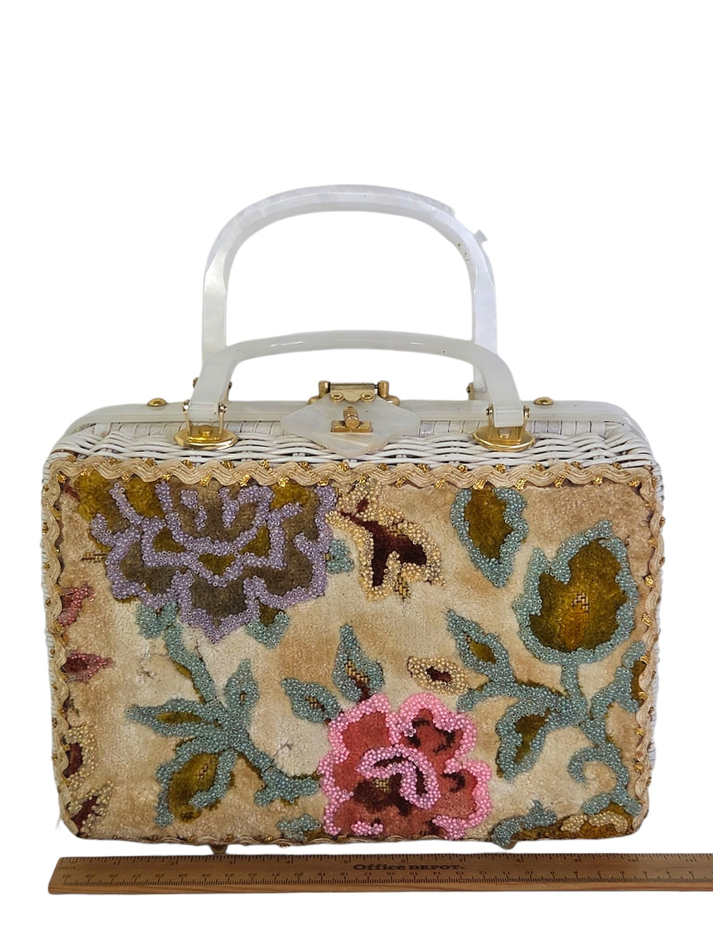 Front of the Tropic beaded velvet box purse beside a ruler, 10 1/2 inches wide