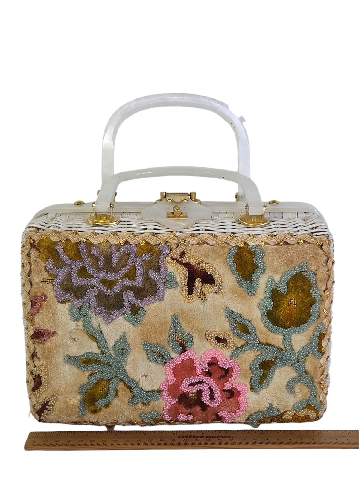 Front of the Tropic beaded velvet box purse beside a ruler, 10 1/2 inches wide