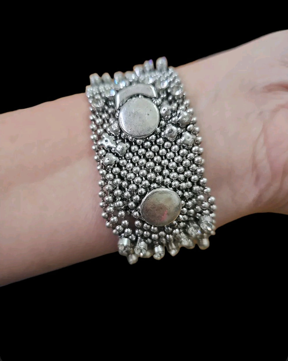 Oddly Darling Vintage wide silver-tone beaded cuff bracelet with metallic mesh and snap-button closure on a wrist.