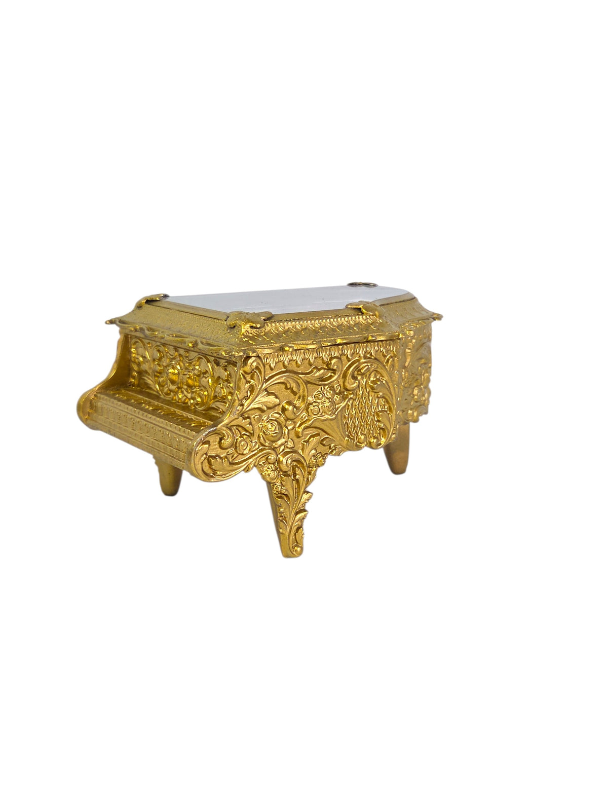 Top view of the open piano jewelry box with two red velvet compartments, music spindle and mirrored lid