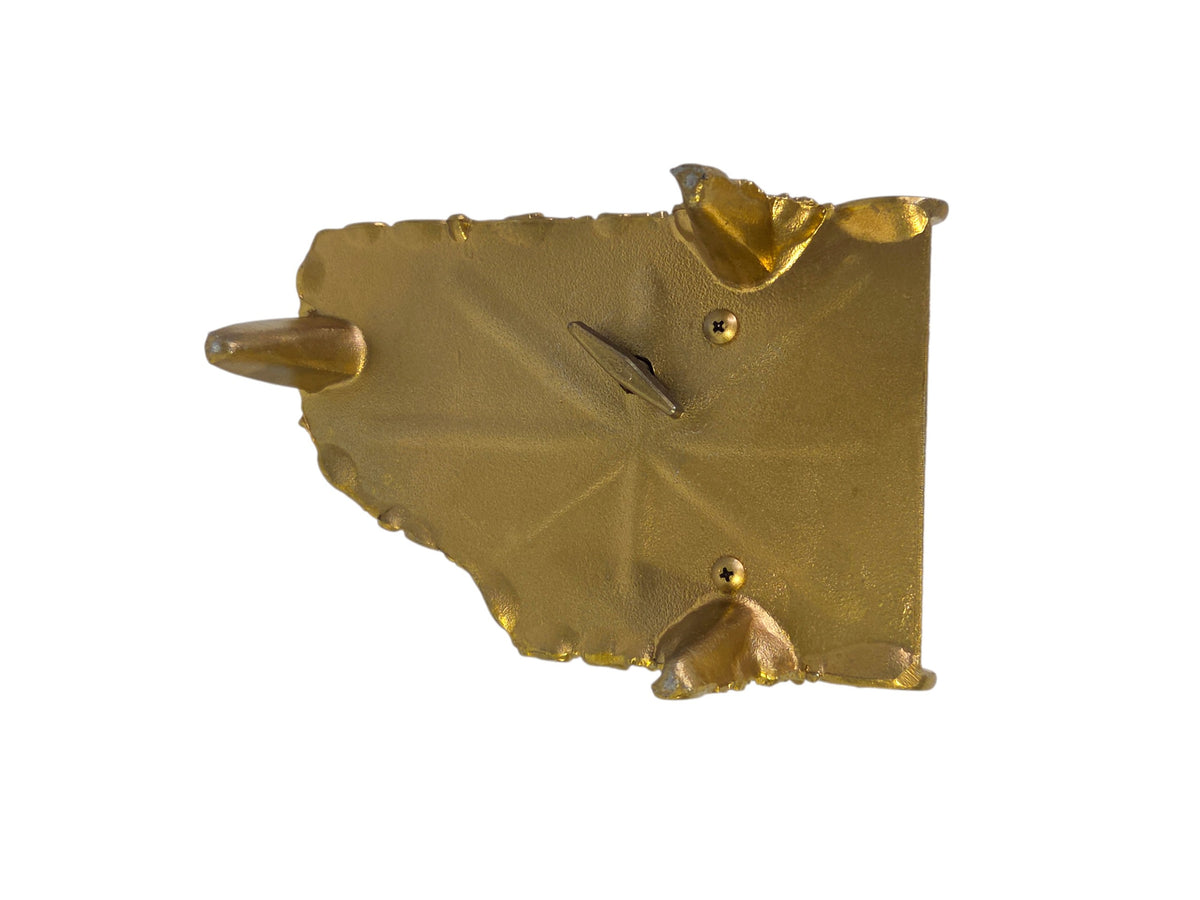 Another angle of the closed piano box showing the butterfly corners and pierced scroll gallery around the lid