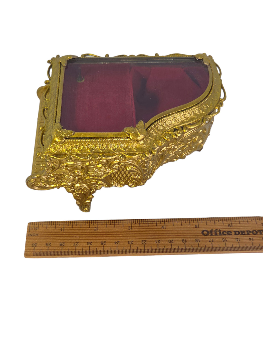 End view of the piano jewelry box showing the little keyboard and embossed roses above it