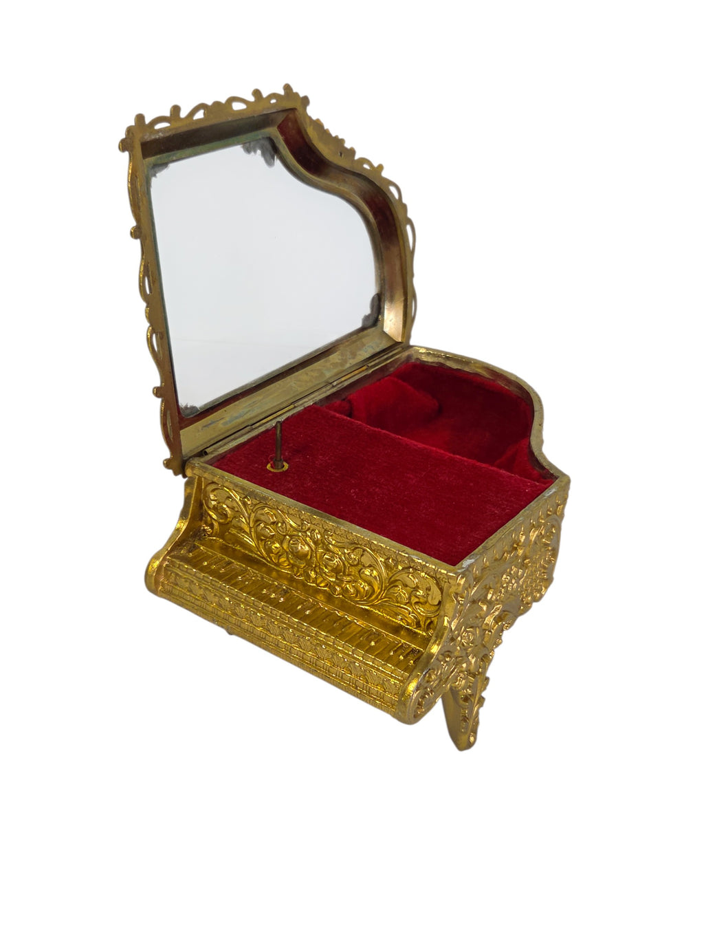 Gold-tone grand piano jewelry box beside a ruler, about 5 1/4 inches long