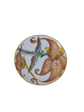 Hutschenreuther Ole Winther hummingbird mini plate on white, Horned Sungem hummingbird flying toward a coral lily with gold accents