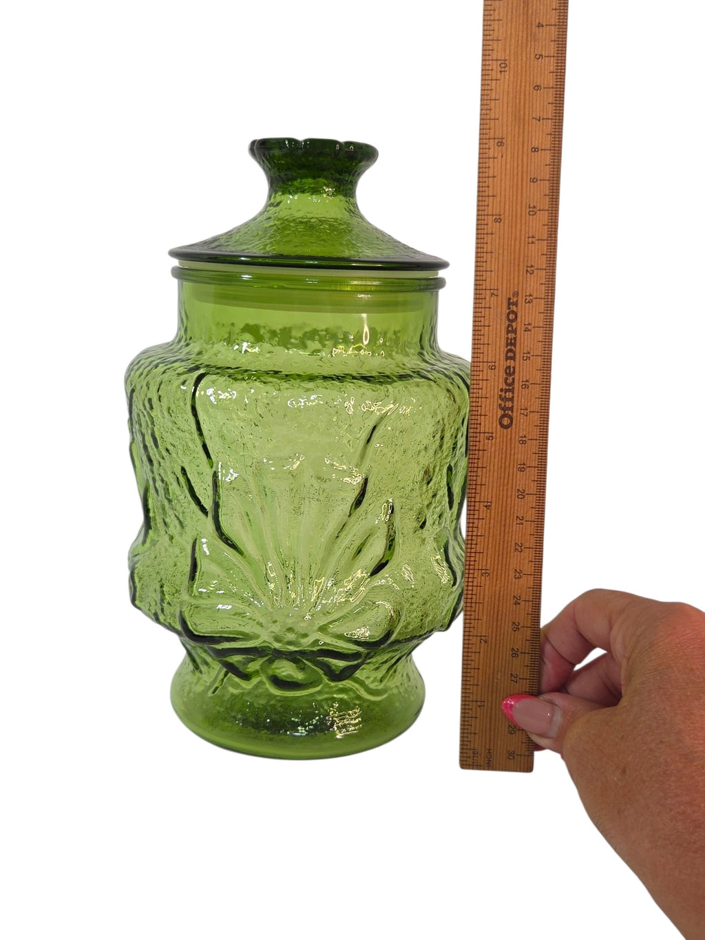 Vintage 1970s green glass canister, close view
