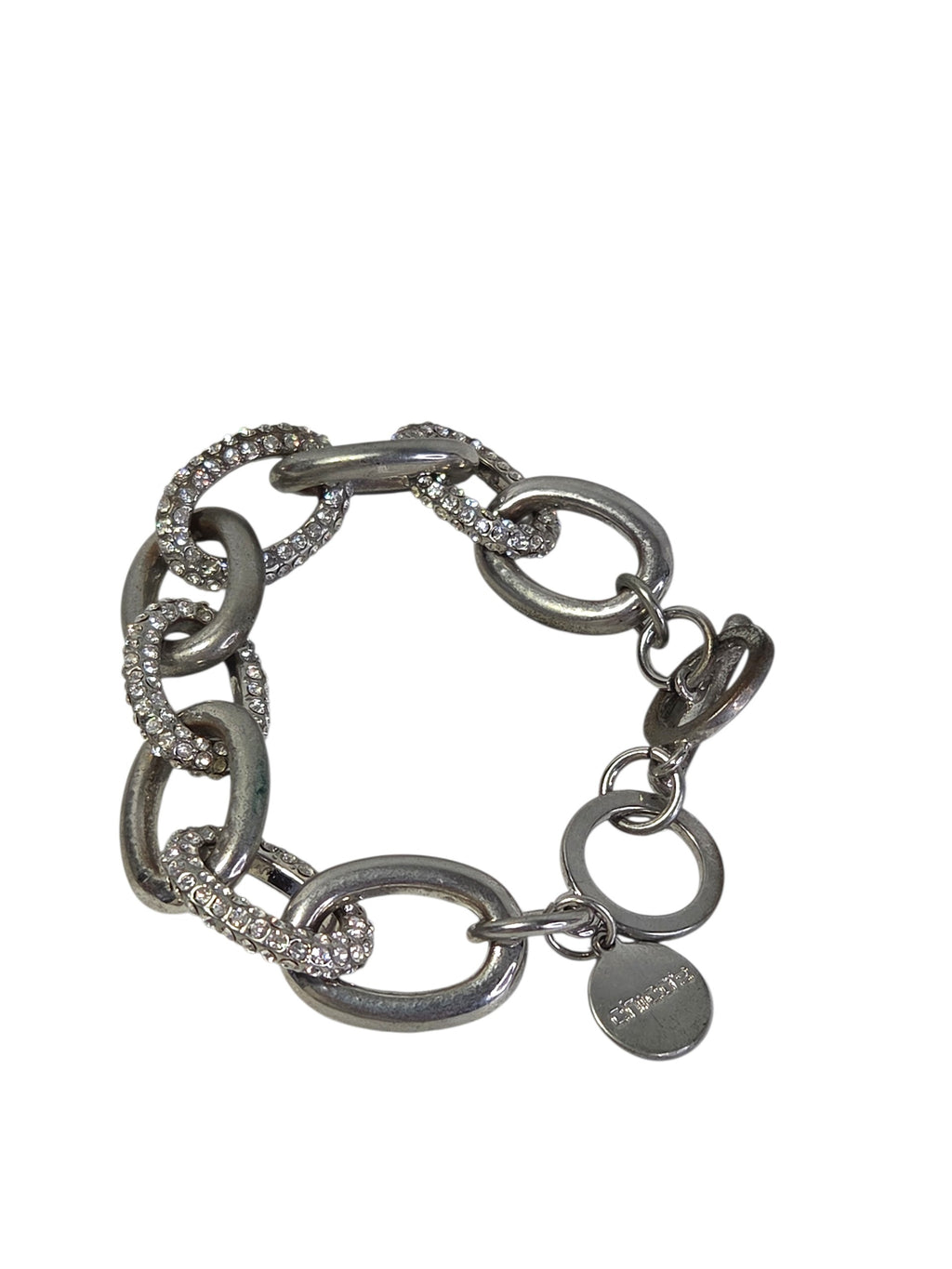 Close-up of the pave crystal links and heavy silver-tone oval links on the Chico's chunky bracelet