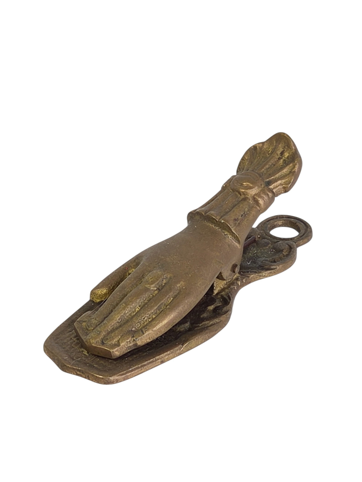 Brass hand clip from the other side, showing the fingers resting on the crosshatch back plate