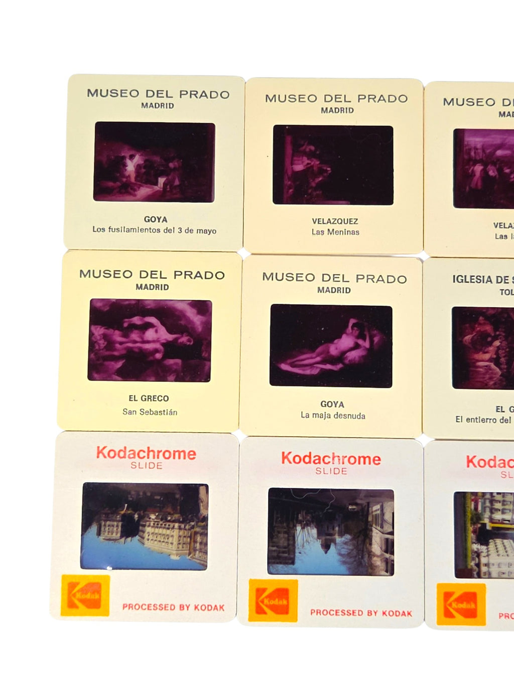 Close-up of Prado souvenir slides of Goya's Third of May, Velazquez's Las Meninas, El Greco's San Sebastian and Goya's La maja desnuda, with Kodachrome travel slides below