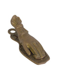 Vintage solid brass lady's hand letter clip on white, showing the ruffled cuff, bow and hanging loop